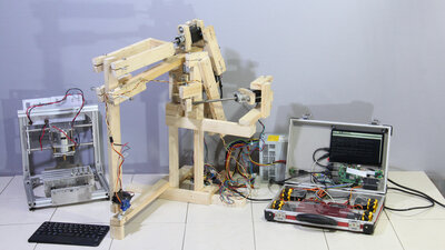 Robotic arm v1.0 composed of roof battens and an old CNC
